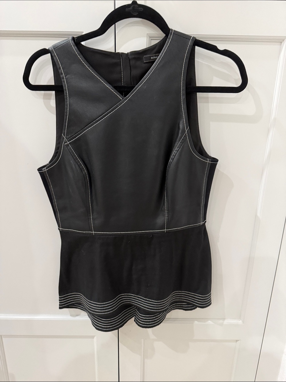 BCBGMaxAzria Black Faux Leather Peplum Tank with White Stitching